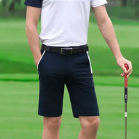 Short de golf bleu marine homme performance face 1